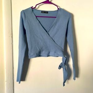 I’m selling a blue crop top sweater